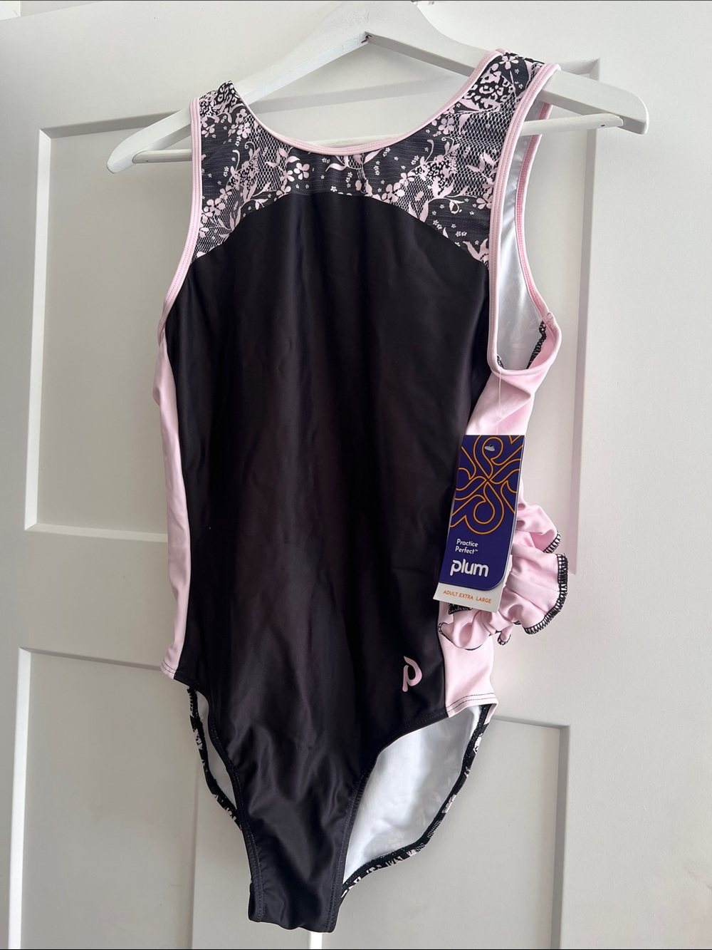 Plum Women's Black & Pink One-Piece bodysuit